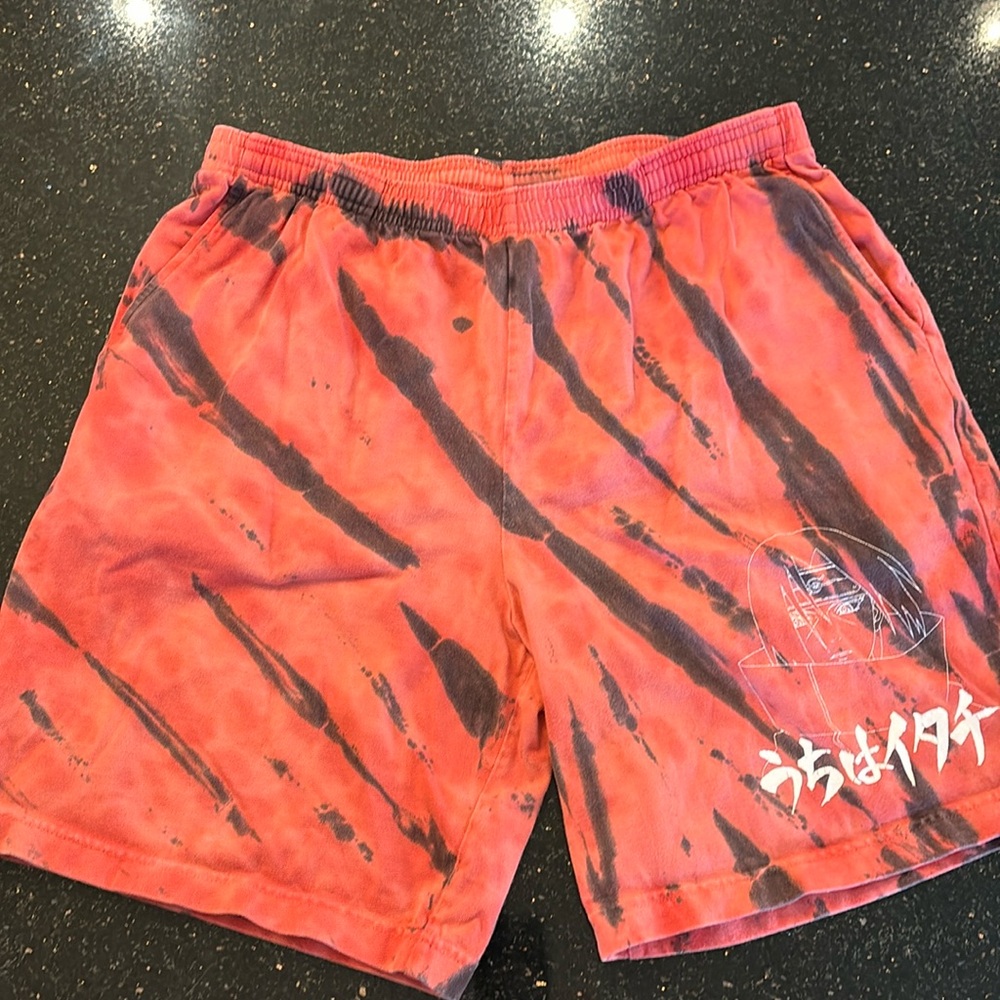Men’s ‘Naruto’ size Medium gym shorts.